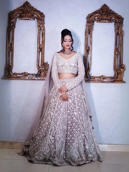 A full-length shot showing the complete pastel lehenga look in all its glory.