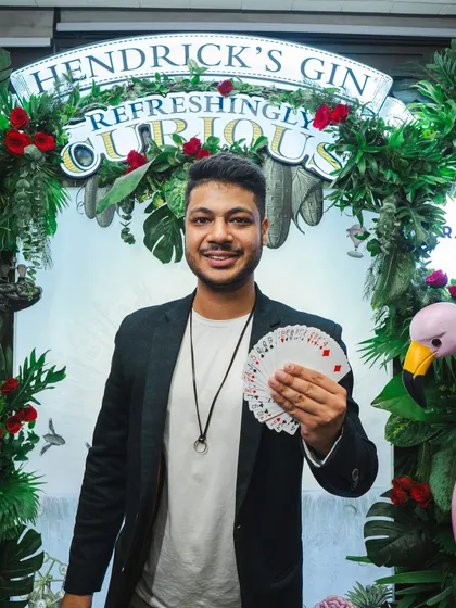 Posing at a Hendrick's Gin event at the Shangri-La hotel in New Delhi. My magic is a perfect pairing for the "refreshingly curious" branding of a premium spirit like Hendrick's.