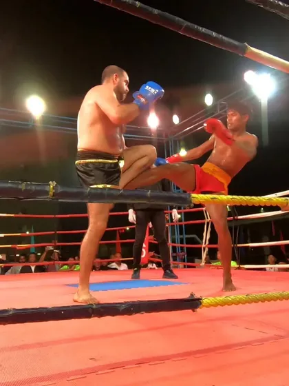 Another perfectly timed kick from our champion, keeping his opponent at bay and scoring points.