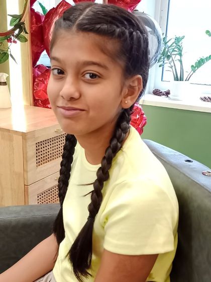 A close-up of the neat and intricate braids, a perfect hairstyle for school, parties, or any day.