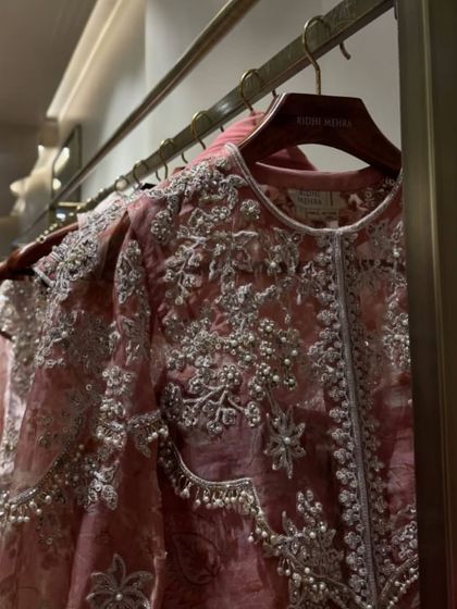 A close-up of the exquisite embroidery and pearl detailing on a Ridhi Mehra creation. Showcasing the craftsmanship of a collection is a key part of my event strategy for designer brands.