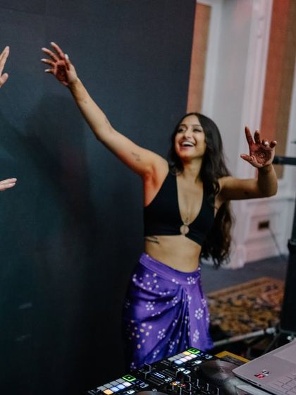 Letting loose and dancing with the DJ at my brother's wedding after-party. From choreographed Sangeet pieces to just vibing on the dance floor, I bring energy to every part of the celebration.