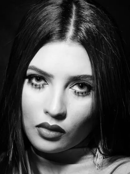 This black and white look features a '60s inspired lower lash line, a technique we cover in our historical makeup modules.