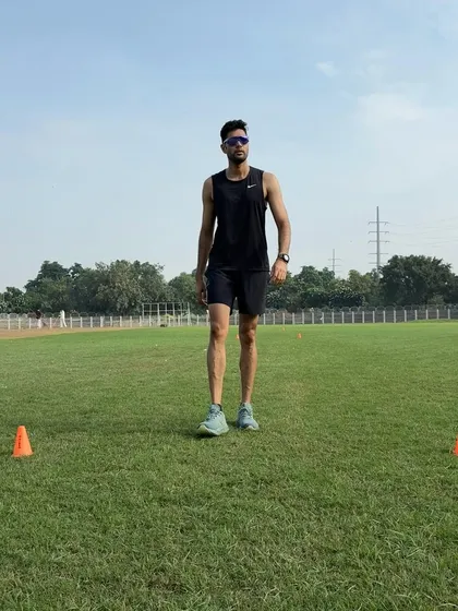 Walking back after a sprint interval. Active recovery and mental focus between high-effort sprints are just as important as the sprint itself for maintaining performance quality throughout a session.