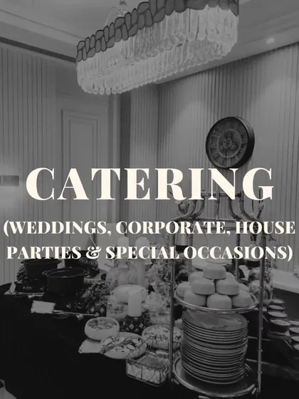 A black and white shot of one of our elegant buffet setups, highlighting the beautiful decor and sophisticated ambiance we create.