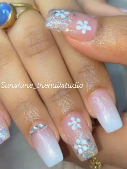 A beautiful set with a white ombre, glitter, and hand-painted flowers.