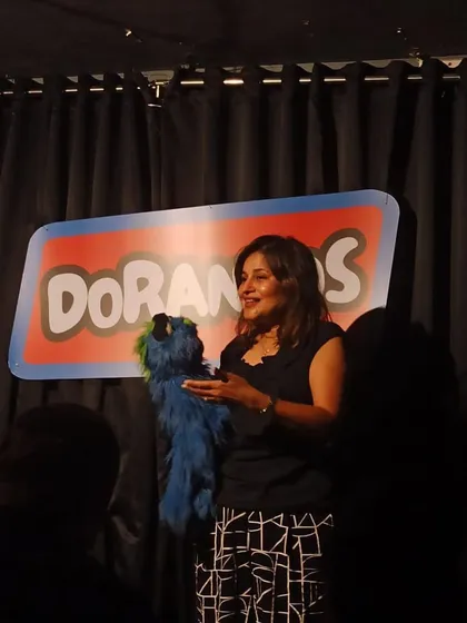 A side profile of me and Jack on stage. This angle shows how I interact with him, creating the illusion that we're having a real conversation.