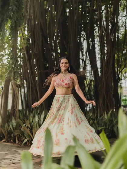 A beautiful, twirling shot that captures the carefree spirit of a Haldi ceremony. The makeup is designed to look great in every photo.