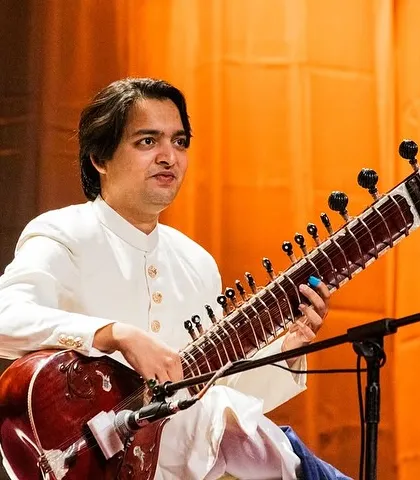 A focused moment during my sitar recital in Nairobi. The stage lighting and atmosphere helped create a perfect setting for a night of Indian classical music.