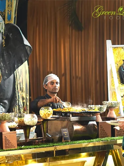 A live food counter is the heart of any wedding celebration. Here, one of my chefs prepares a fresh, sizzling dish right before the guest's eyes, creating an interactive and engaging dining experience that everyone loves.