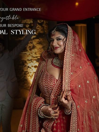 Make your grand entrance unforgettable with our bespoke bridal styling. This bride looks radiant and confident in her classic red Sabyasachi lehenga.
