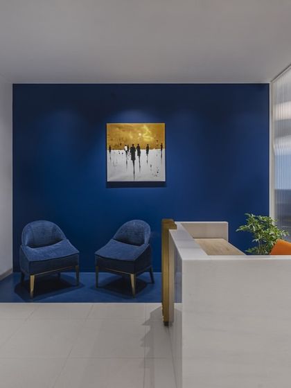 Elevate your headquarters. This Mumbai office blends sophisticated design with comfort. I used a serene blue reception area to foster a sense of calm and focus from the moment clients arrive.