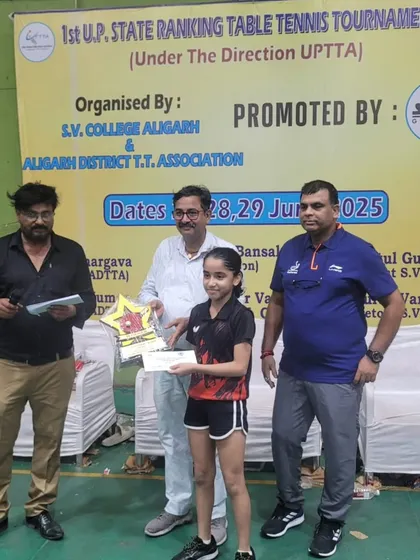 Pehel Gupta with her trophy after becoming the U-13 Girls champion at the state ranking tournament in Aligarh.