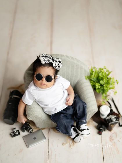Here's our new boss lady, ready to take on the world. This theme is so much fun for baby girls too, showing off their cool and confident side from day one.