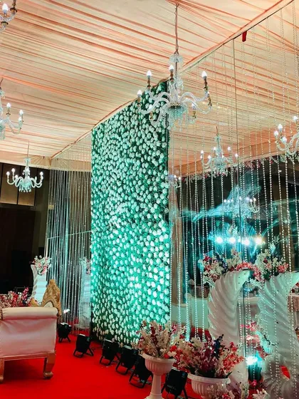 A side view of the indoor stage, highlighting the mirror panels and crystal strings that add sparkle and depth.
