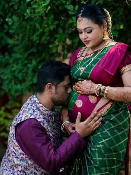 A precious moment from Kruthika's maternity shoot. The makeup is kept natural and radiant to capture the beauty and emotion of this special time.