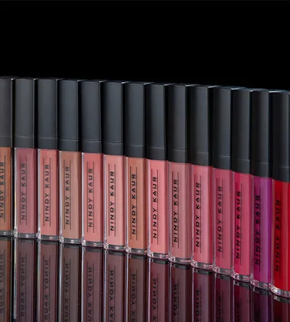 For e-commerce, we create clean, uniform shots that showcase your entire product line, like this lineup of liquid lipsticks, ensuring color accuracy and a professional look for online stores.
