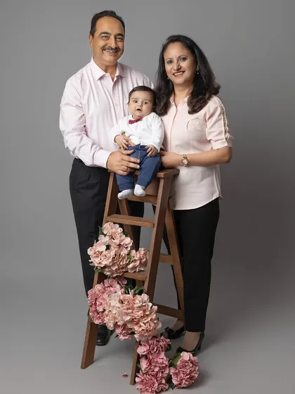 Grandparents with their precious grandchild. The pride and joy on their faces is unmistakable. I am always honored to capture these milestone family moments.