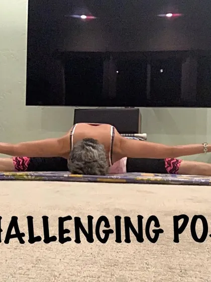 Here I am holding a challenging split pose, showing the strength and openness that comes from a regular yoga practice.
