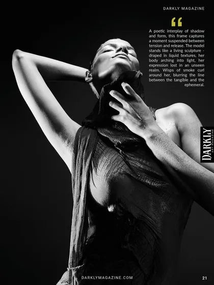 From the 'Elegy in Motion' series in Darkly Art Magazine. This black and white shot captures the model as a living sculpture, with light and shadow defining her form.