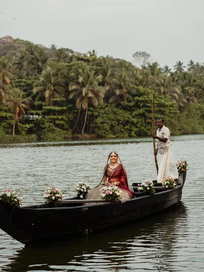 The bridal boat entry offers a serene and majestic alternative to traditional arrivals. As the bride glides towards the ceremony, it creates a tranquil yet impactful moment, perfectly suited for a waterside destination wedding.