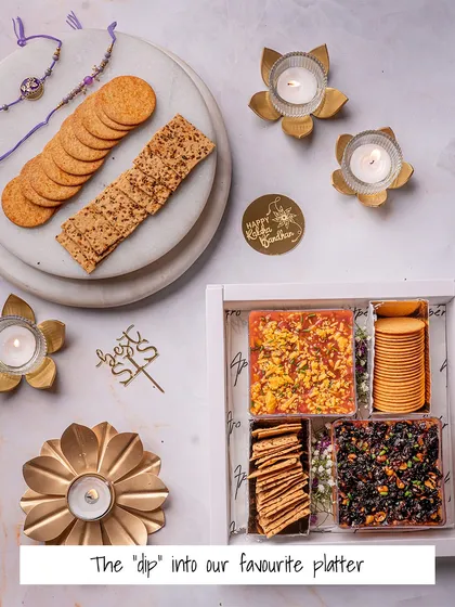 For the savory-loving sibling, our 'Dip into our Favourite Platter' for Rakhi. This hamper features our popular dips and assorted crackers, perfect for sharing.