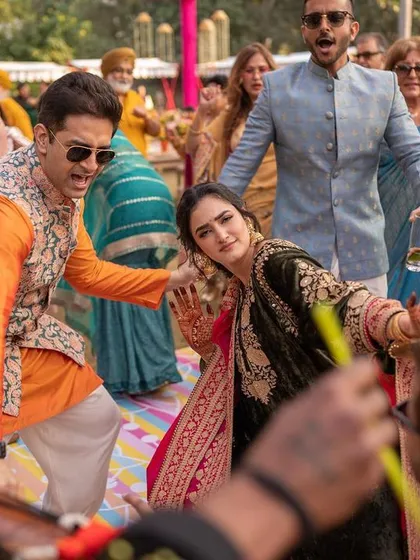 This is what a real Delhi Punjabi wedding feels like. Pure, non-stop energy and dancing on the dhol. I love capturing the wild, fun, and candid moments of a Mehendi party where everyone just lets loose and celebrates. It’s all about documenting the joy of the celebration.