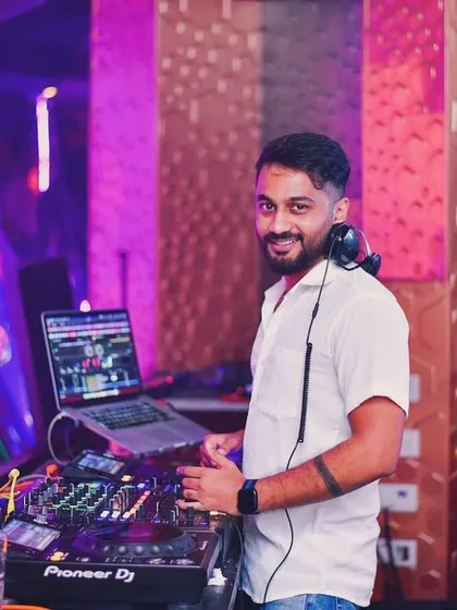A shot of me at my console at BOHO, ready for the night to begin. I use professional Pioneer DJ equipment to deliver a flawless audio experience.