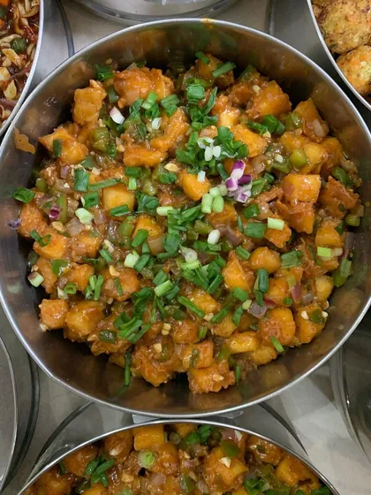 A bowl of crispy Chilli Paneer.