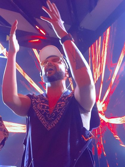 Hands up for the weekend. This is the universal sign for a great party, and I make sure it happens every time.