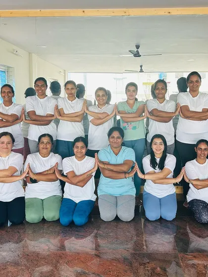 The group poses together after completing 108 Sun Salutations for Rathasapthami. Their dedication and energy were incredible.