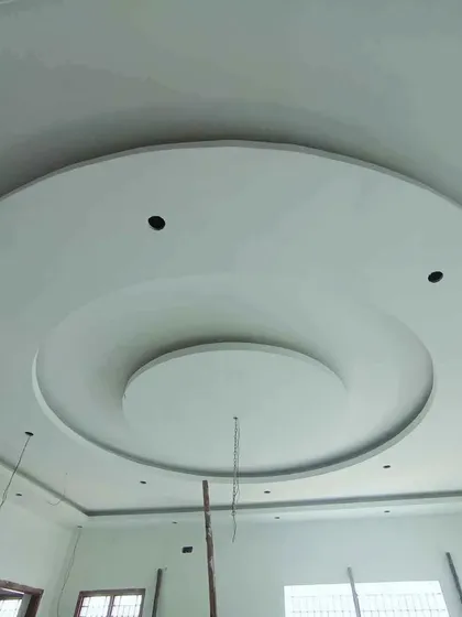 A simple and clean circular POP design, perfect for a minimalist bedroom or study. The holes for spotlights are pre-cut.