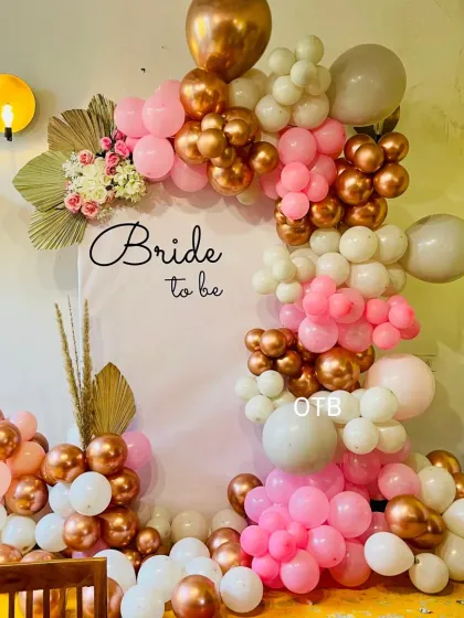 A wider shot of the boho-chic bridal shower decor, showing how it fits beautifully into a home setting.