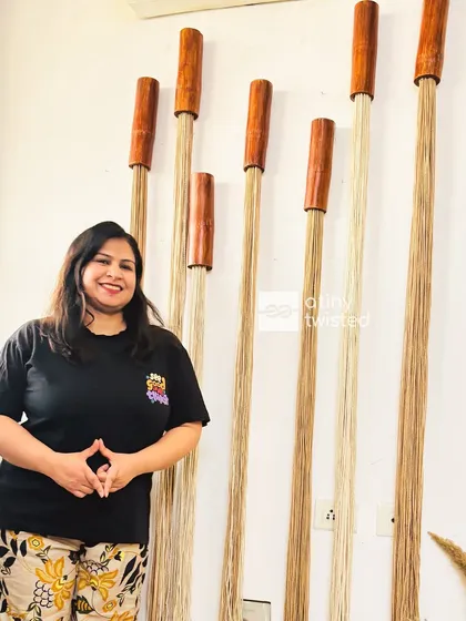 Standing proud next to one of my creations. This wall art combines polished wood with the raw texture of jute, creating a minimalist yet impactful piece that feels both modern and natural.