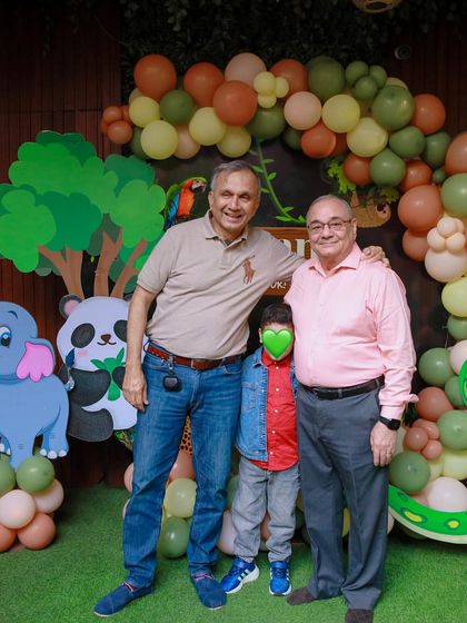 Grandparents and family members join the birthday boy for a photo. Our parties are designed for the whole family to enjoy and celebrate together.