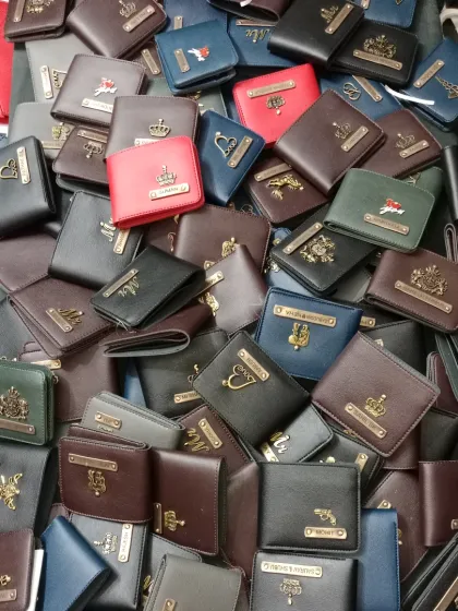 So many choices to make it uniquely his. This is just a small glimpse of the variety of personalized wallets I have created for my customers, each with a unique name, color, and charm.