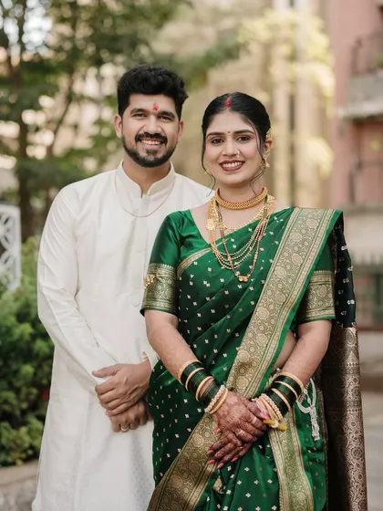 A simple and sweet portrait of the newlyweds. Their genuine smiles and comfortable stance showcase the happiness of the moment.