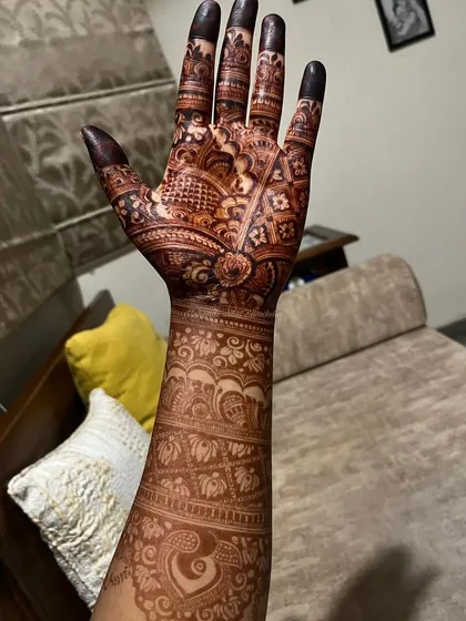 The color we always wanted! A single hand showing off a stunningly dark and crisp bridal stain.