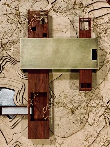 This handcrafted model shows a site specific insertion. We build these from wood and aged brass to feel the project with our hands. It is an exploration of how a building can be powerful yet sympathetic, strong yet soft, where art and soul intertwine.