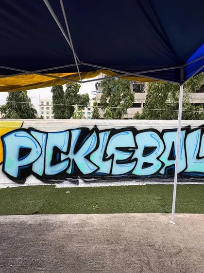 I also painted the word "Pickleball" in a classic graffiti font on another wall at the court.