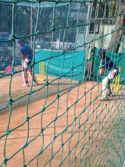 A view from behind the nets during a busy summer batch session. This is the daily scene of hard work at our academy.