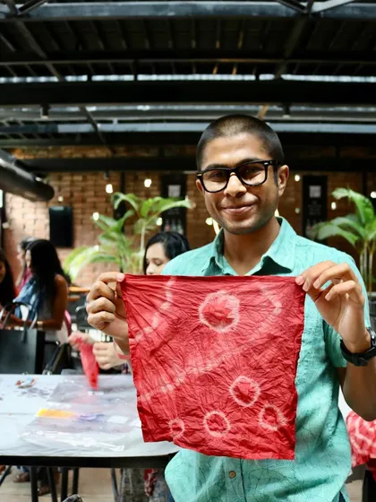 This participant created a lovely napkin with soft, circular patterns. The smiles on everyone's faces are the best part of any workshop.
