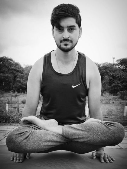 Tolasana, or Scale Pose, is an arm balancing pose that requires significant arm, wrist, and core strength. It's a great asana for increasing focus and improving mobility in the legs.