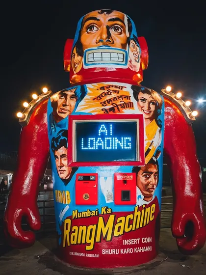 A red 'Rangmachine' at night. The design is inspired by truck art and arcade machines.
