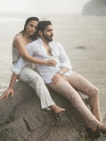 A raw and powerful portrait of Gokul and Vandana set against the churning waters of Athirappilly. This image from their vow renewal shoot feels intense and cinematic, reflecting a love that has weathered every storm.