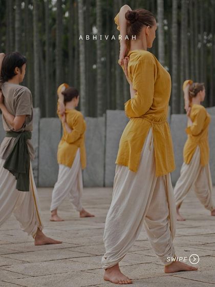 This posture, Gomukhasana (Cow Face Pose) arms, helps open the shoulders and chest. It is part of the sadhana that creates a conducive atmosphere in the body, allowing karmic and genetic memory blocks to slowly dissolve.