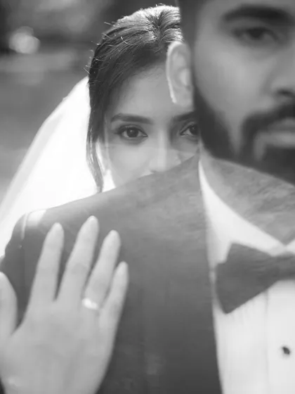 An artistic and emotional portrait from a Catholic wedding. Through creative composition, we aim to capture the profound bond between the couple, creating a timeless and evocative memory.