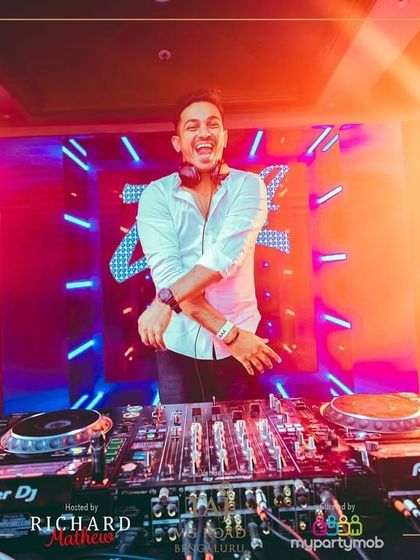 A moment of pure joy and laughter behind the decks. This is what it looks like when you truly love what you do.