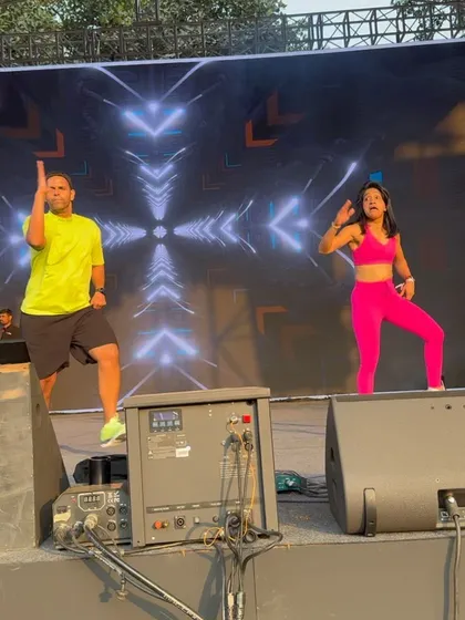 On Stage at the Summit: Performing on stage with my dance partner at the Under 25 Summit. The energy from the crowd was electric.