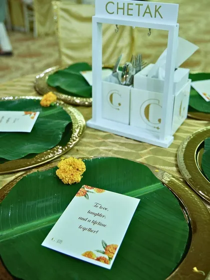 We honour heritage through details like our traditional banana leaf plating. Set upon hammered metal thalis, this eco-friendly and aromatic presentation connects your dining experience to deep-rooted Indian customs of purity and respect.